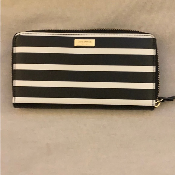 kate spade Handbags - Kate Spade black and cream zip around wallet